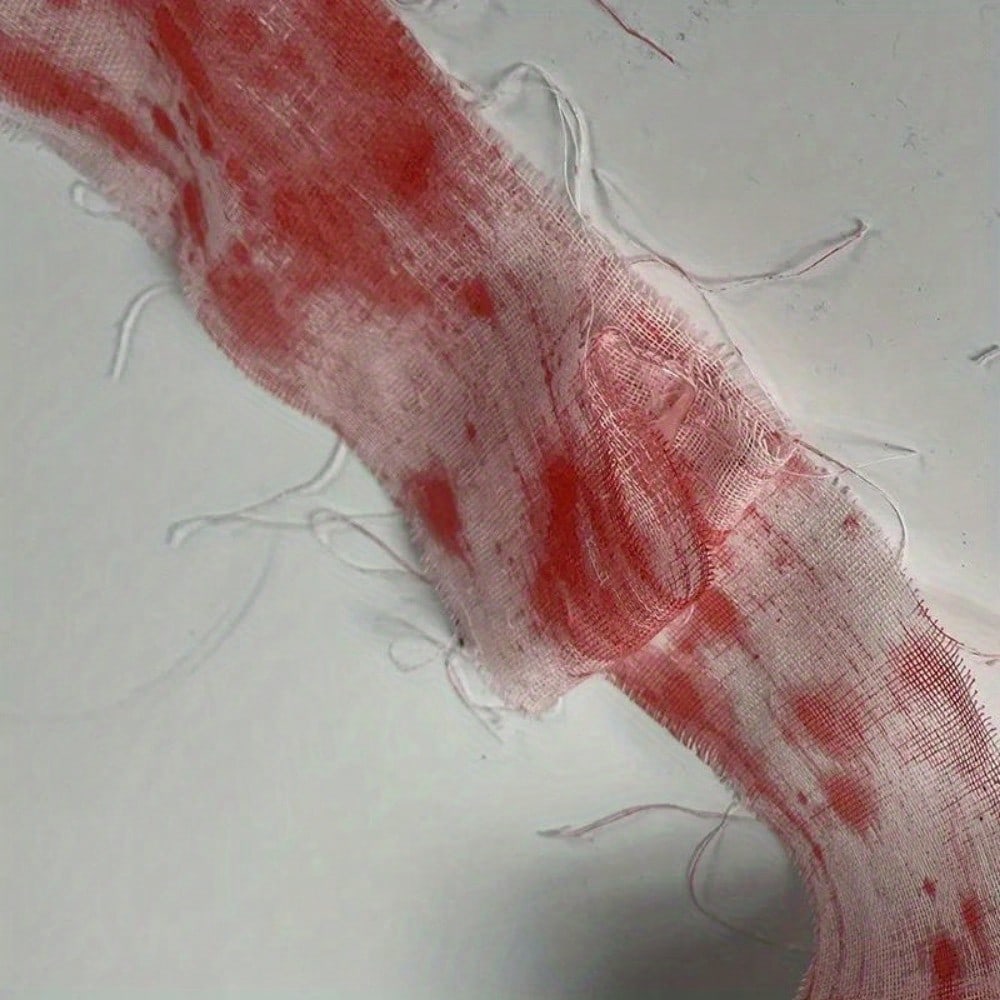 A roll of toilet paper designed to look like blood-stained gauze, likely for Halloween or horror-themed decor.