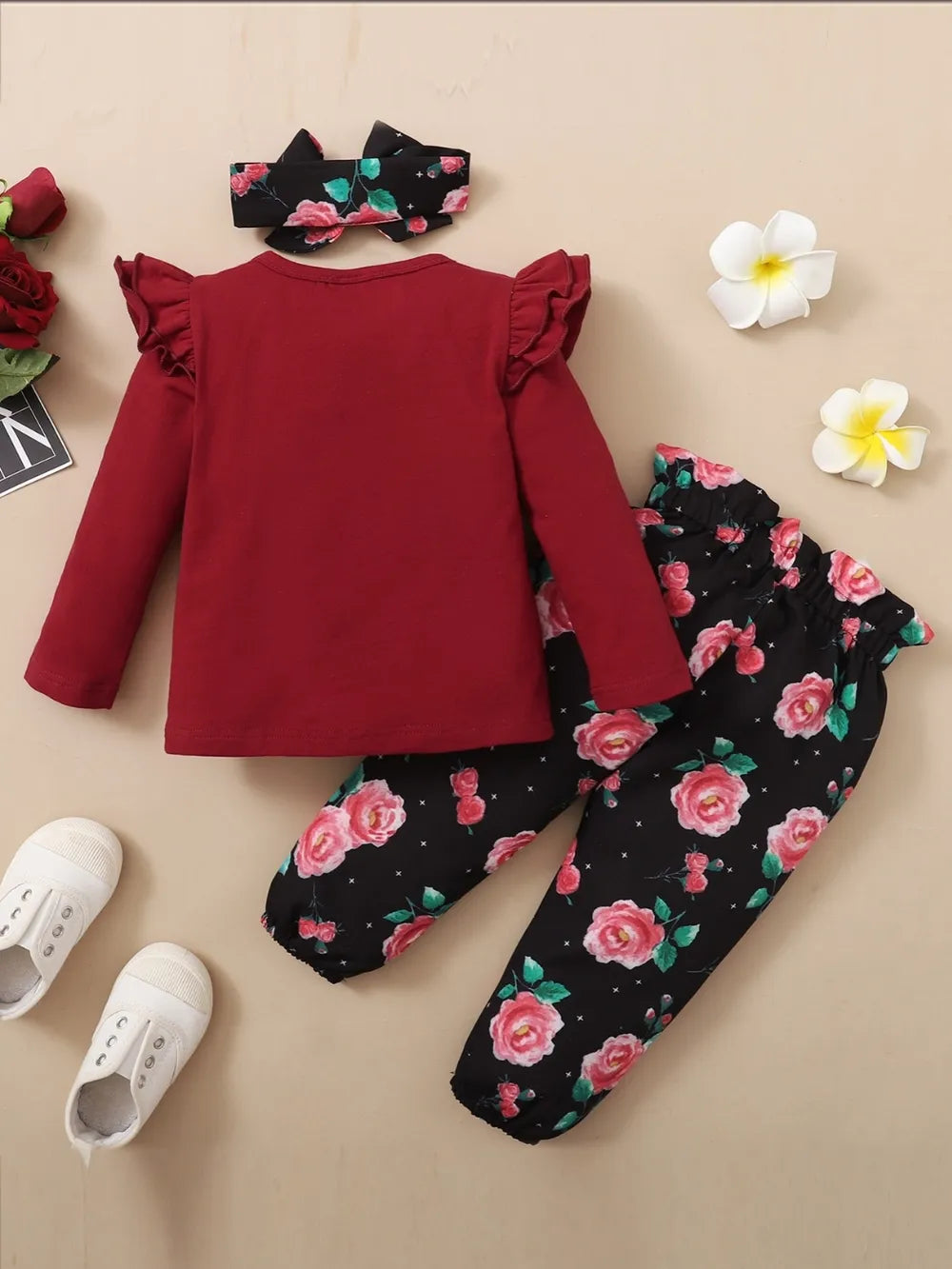Baby girl outfit set in maroon with floral print top, coordinating bottoms, and headband