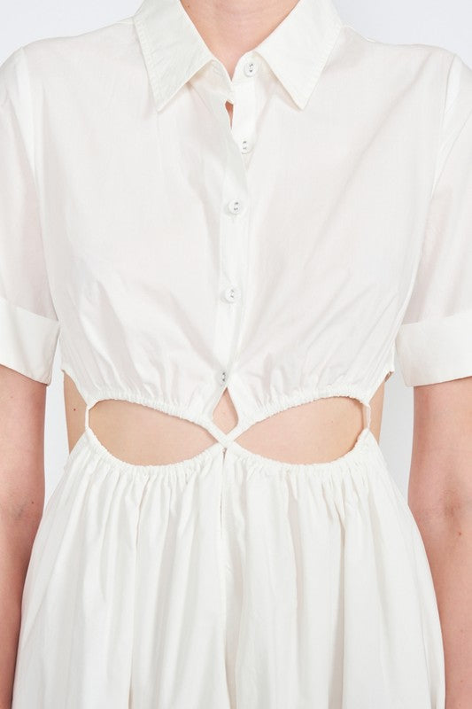Woman models a white midi dress with a collar, short sleeves, and trendy cut-out details, close up view.
