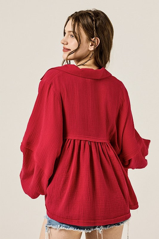 Collared V-neckline offers a flattering open neckline.