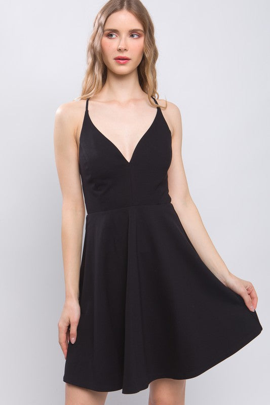 Black backless skater dress, front