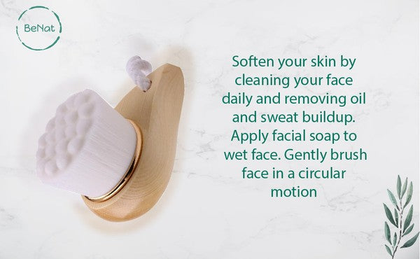 Eco-friendly facial brush with bamboo handle and soft bristles for gentle exfoliation and cleansing