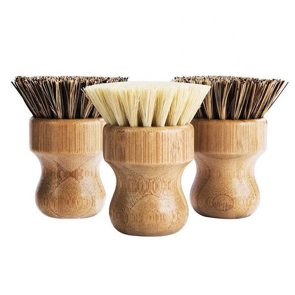 The bamboo-sisal fiber dish brush is a sturdy, eco-friendly scourer with firm sisal bristles mounted on a bamboo handle, ideal for cleaning dishes and scrubbing stubborn residue.