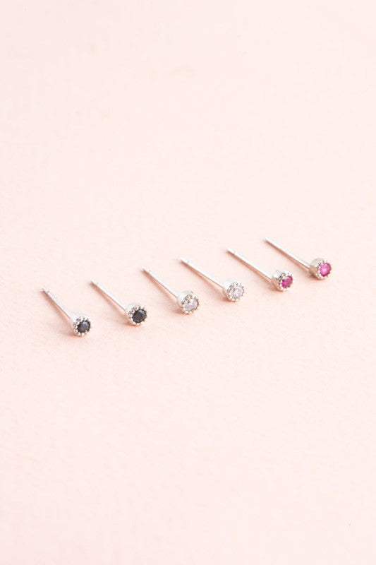 Sparkle in every size. The Bedazzled Stone Stud Earring Set in Silver features a curated collection of shimmering studs, each designed to add a touch of glam to your everyday or evening look. Whether you're layering multiple piercings or switching up your style, this set gives you options that shine.