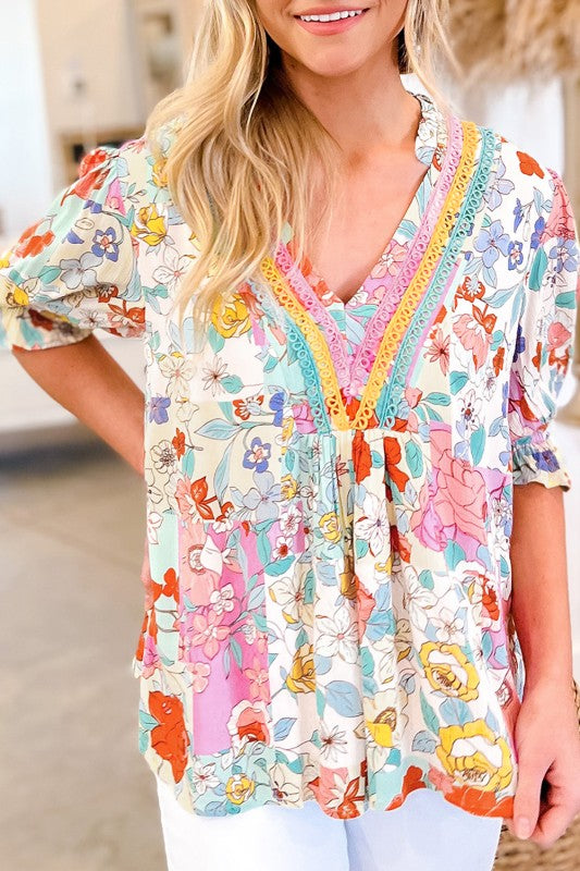 Feminine and easy to pair — let the blouse be the statement when styling.