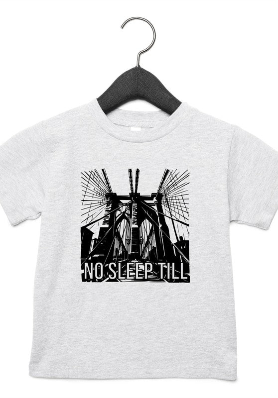 White t-shirt with black graphic design and 'No Sleep Till' text on a hanger against a white background