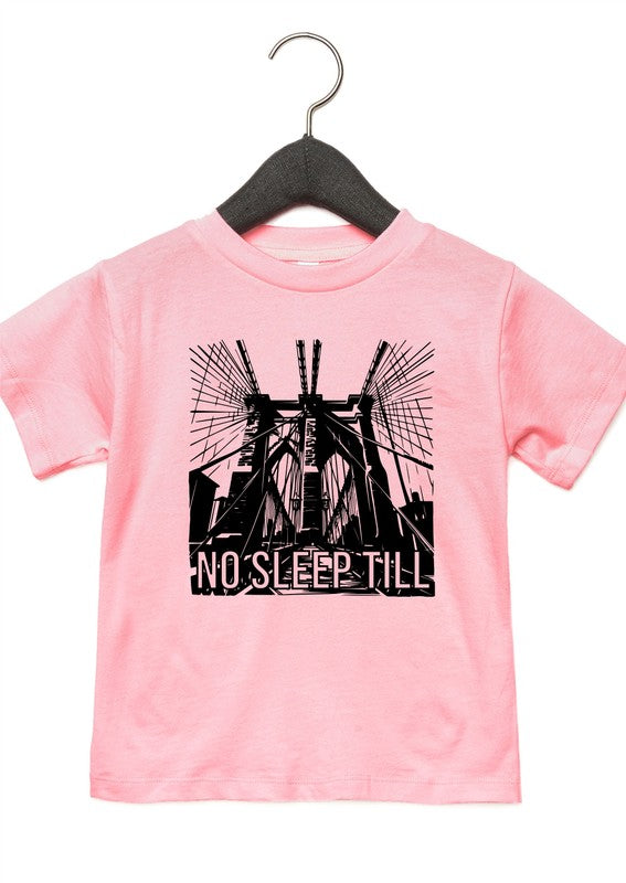 Pink t-shirt with black graphic design and 'No Sleep Till' text on a hanger against a white background