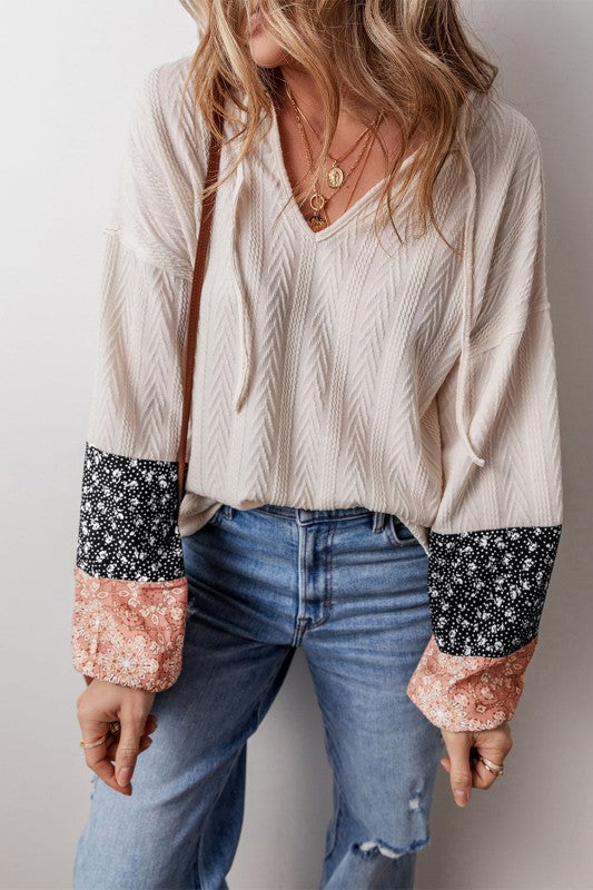 V-neck silhouette for a flattering neckline.