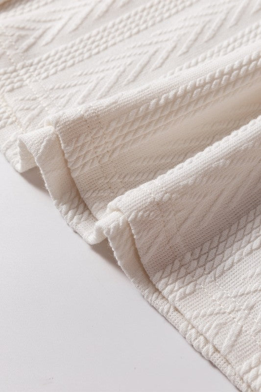Length varies by size — ~64-70 cm front length from smallest to largest.