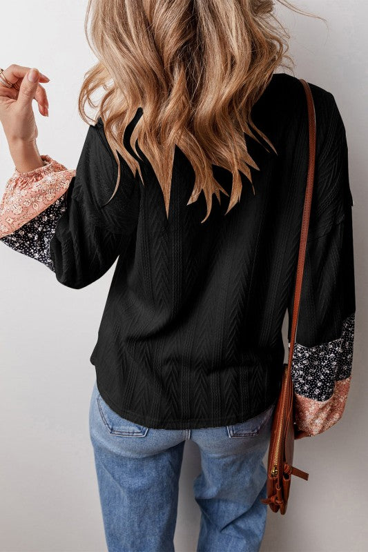 Cable-knit texture offers subtle dimension and interest.