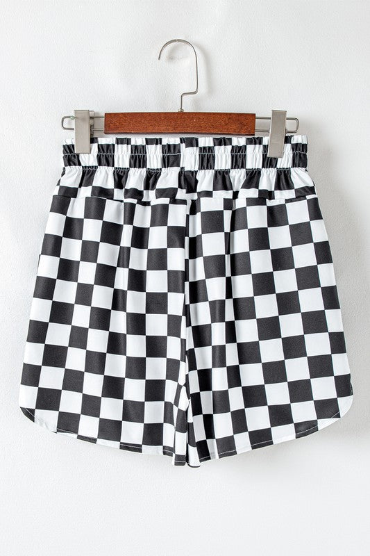 Bold pattern. Flattering fit. Everyday ease. These checkered high-waist shorts are your go-to for casual cool. With a classic print and a silhouette that hugs just right, they’re perfect for sunny strolls, coffee runs, or laid-back hangouts.