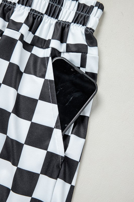 Bold pattern. Flattering fit. Everyday ease. These checkered high-waist shorts are your go-to for casual cool. With a classic print and a silhouette that hugs just right, they’re perfect for sunny strolls, coffee runs, or laid-back hangouts.
