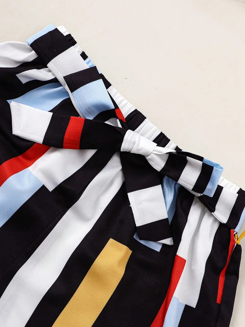Children’s matching set: spaghetti strap ruffle top paired with soft pants, made for comfort and style