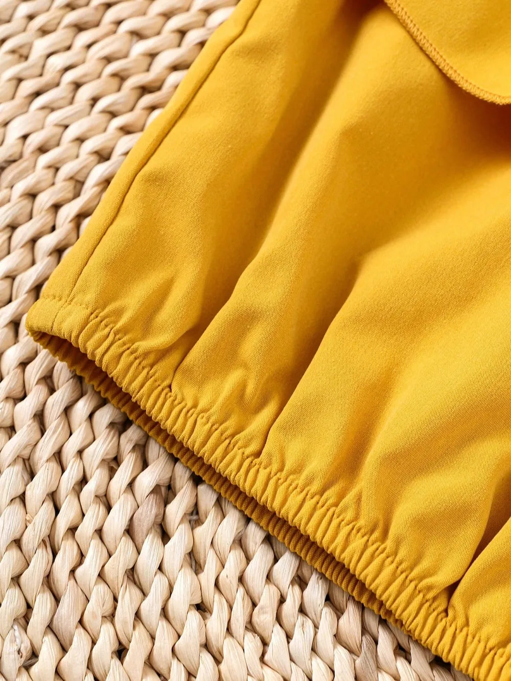 Children’s matching set: spaghetti strap ruffle top paired with soft pants, made for comfort and style