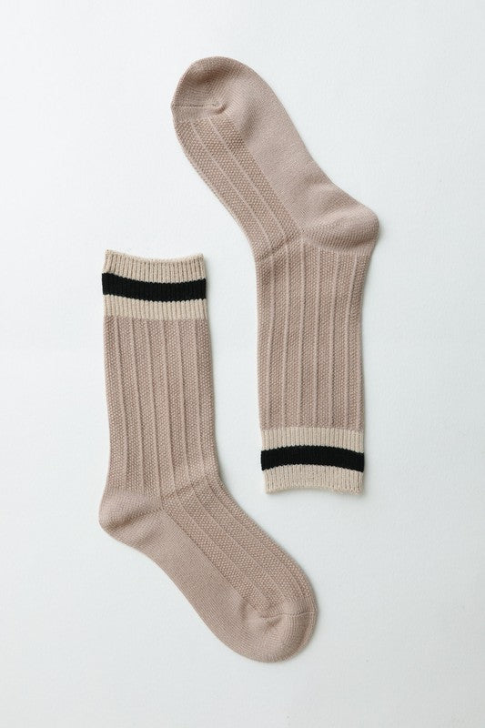 Crew socks with striped cuffs, offering a soft, stylish option.