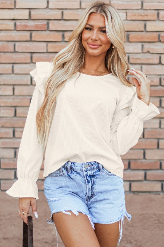 Long sleeves provide coverage while maintaining style.