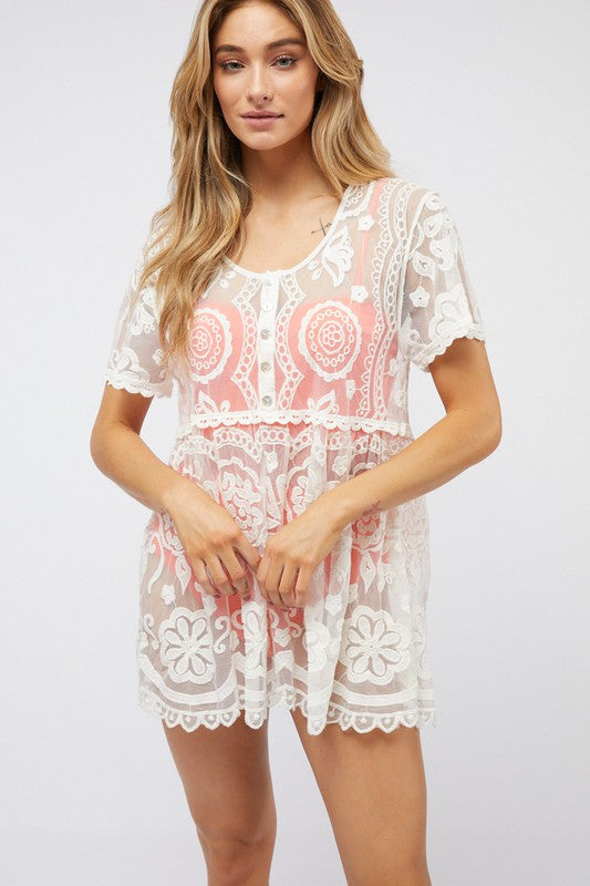 Crocheted front meets solid backing for a balanced look of coverage and intrigue.