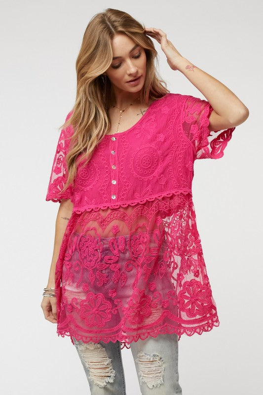 Style it tucked or untucked — this top’s pattern shines either way.
