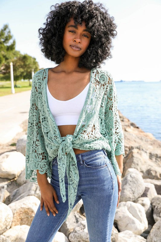 Tie closure lets you wear it open or cinched at the waist for shape.