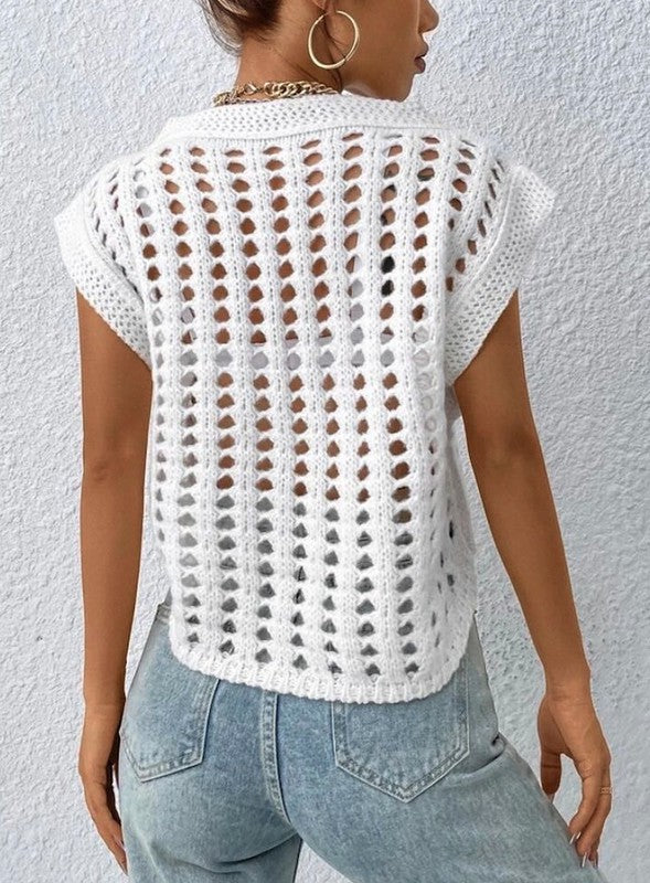 Airy and stylish, this crochet vest adds vintage charm to any outfit.