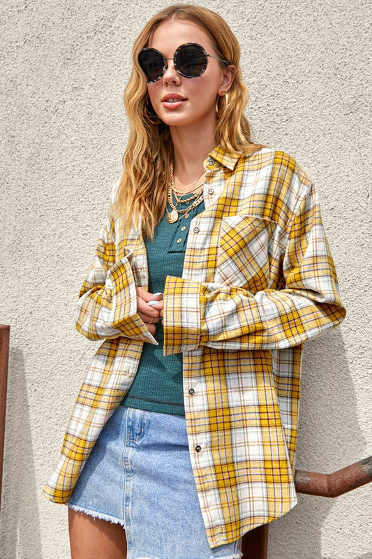 Hem sits around hip-length in size Small, offering a relaxed drape.