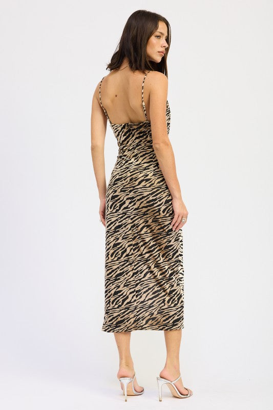 Elegant midi dress with draped cowl neckline and side gathers, offering a flattering silhouette for evening events and formal occasions
