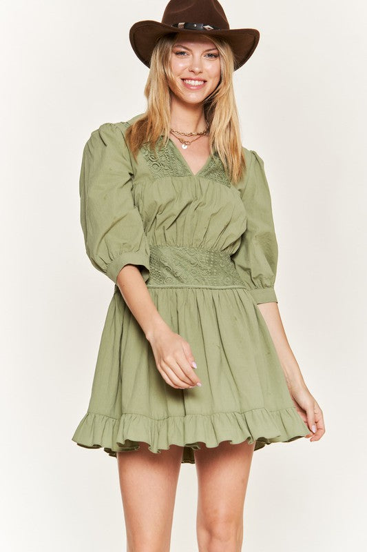 3/4 sleeves with buttoned cuffs offer style and modest coverage.