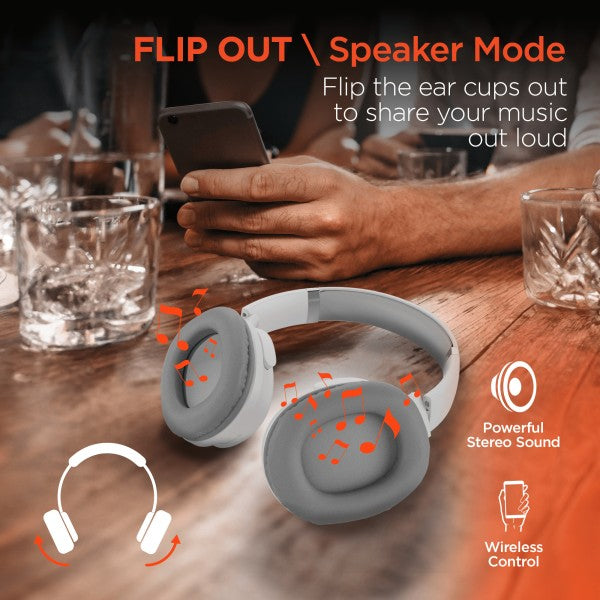 White headphones in speaker mode with musical notes—shown in a social setting, highlighting wireless control and powerful stereo sound.
