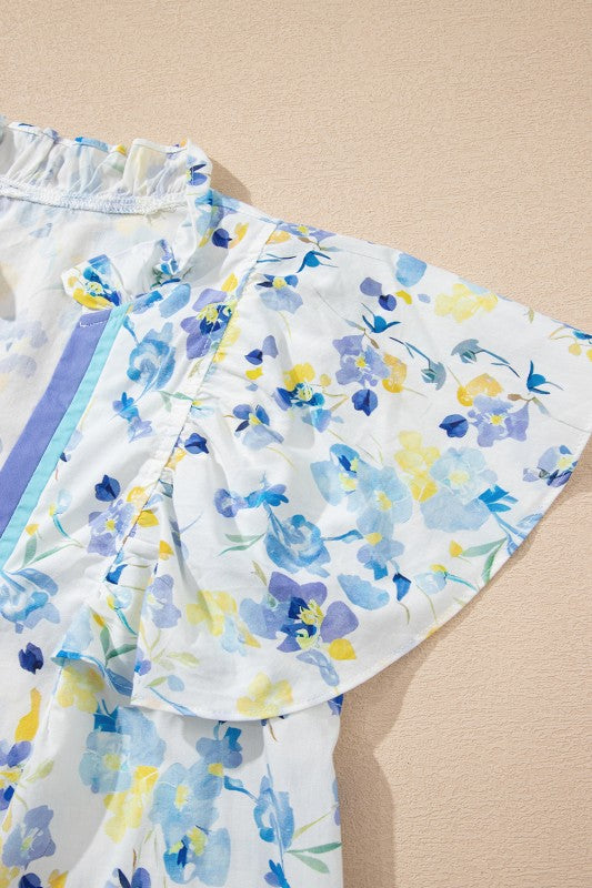 Loose, relaxed cut that works well with both fitted and loose bottoms.