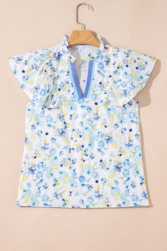 Elegant ruffles and floral design make it gifting-friendly.