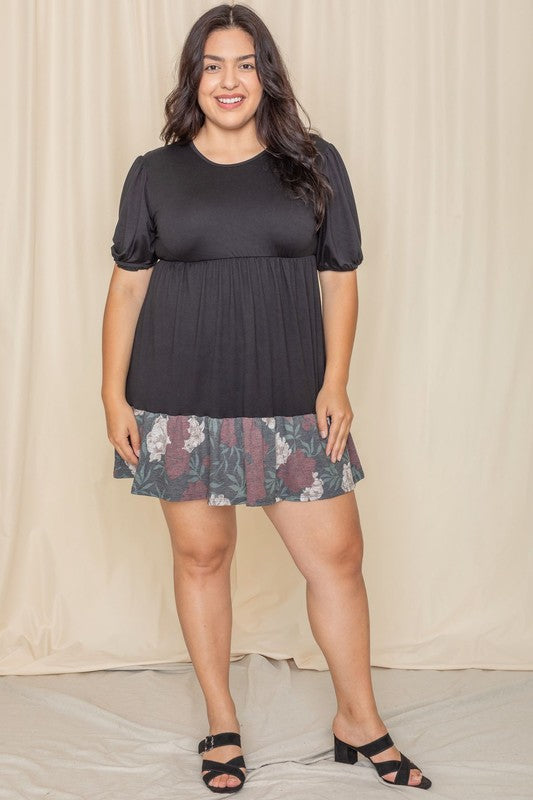 Woman wearing a Floral Two Tone Tiered Mini Dress