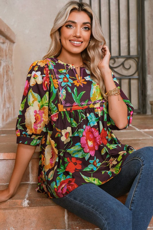 Embroidered trim adds a delicate, feminine detail to the design.