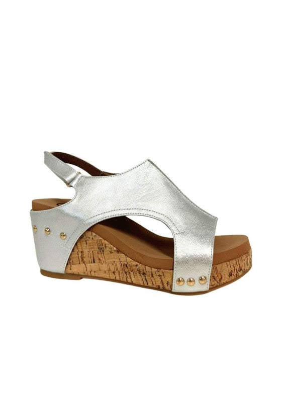 Platform wedge sandals with textured fabric upper, cutout design, ankle strap buckle, cork wedge heel, and open-toe style