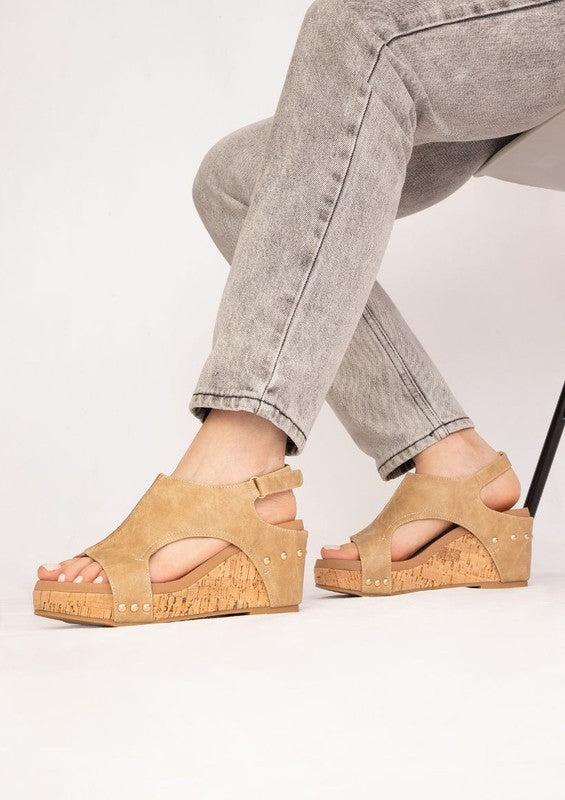 Platform wedge sandals with textured fabric upper, cutout design, ankle strap buckle, cork wedge heel, and open-toe style