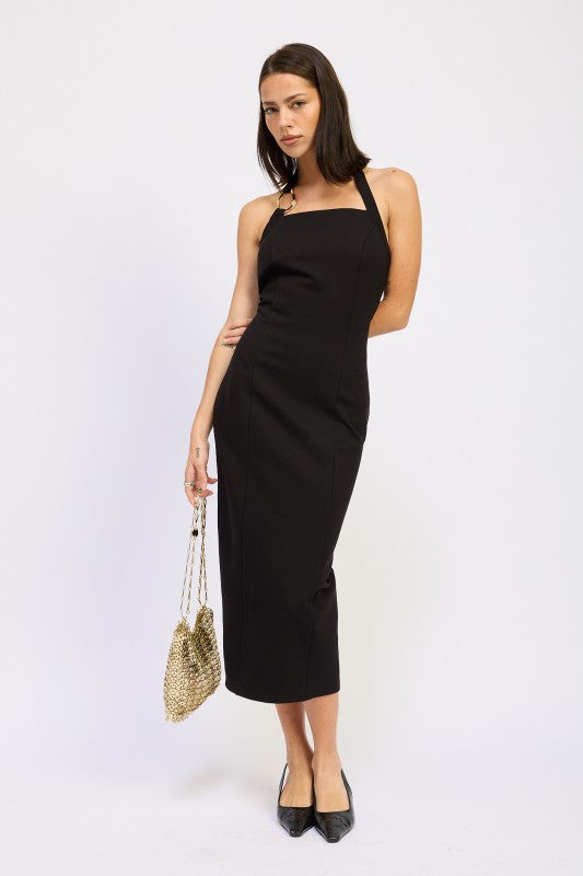 Woman models a chic halter neck midi dress in a black color, featuring an elegant design, full front view.