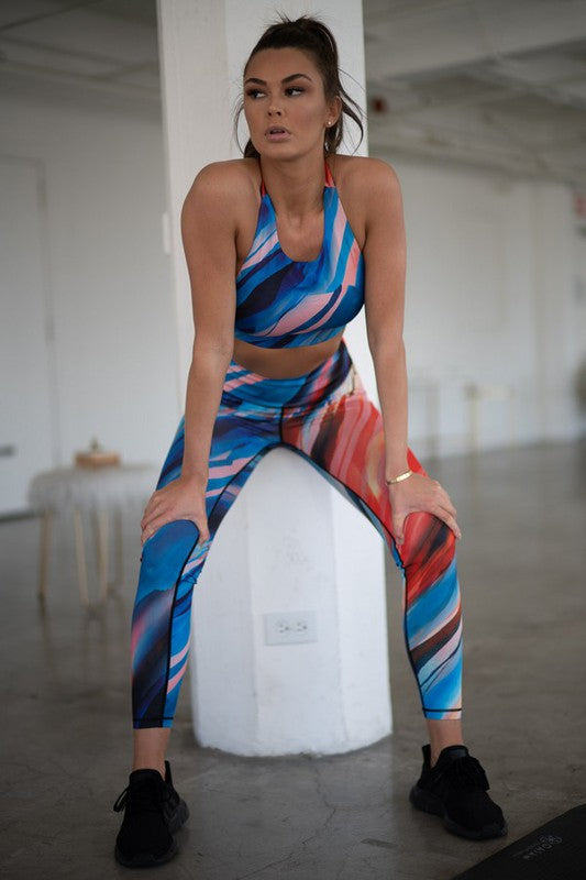 Turn your workout into a runway with these High Rise Watercolor Activewear Leggings. Featuring a dreamy splash of watercolor print and a sculpting high-rise fit, these leggings are made to move—and made to be seen. Whether you're flowing through yoga or powering through cardio, they’ll keep you supported, stylish, and totally unstoppable.
