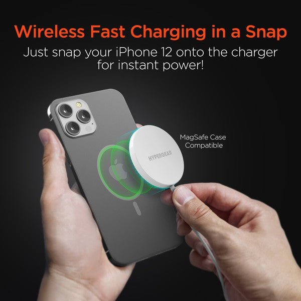 A MagSafe-compatible wireless charging pad with USB-C input, magnetically charging a smartphone with glowing green and blue LED indicators.