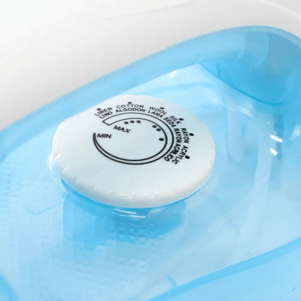 The Impress Mid-Size Iron with Non-Stick Soleplate is a compact household iron designed for smooth glide and easy cleaning, featuring a durable non-stick soleplate for wrinkle-free results.