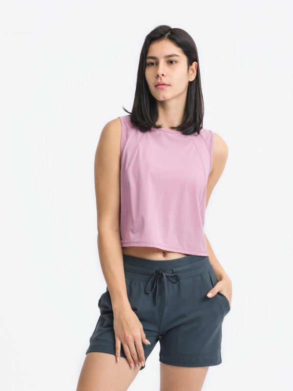 Flattering fit. Effortless style. The JupiterGear Round-Neck Cropped Tank is your new go-to for workouts, layering, and laid-back days. With a clean round neckline and a cropped silhouette that hits just right, this tank blends sporty function with everyday fashion.
