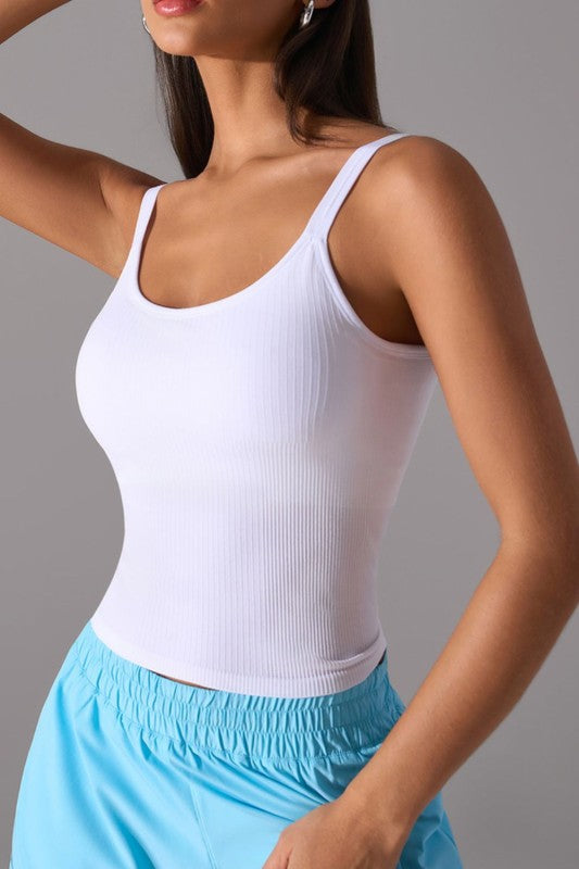 This is the tank top your wardrobe’s been waiting for. The JupiterGear Scoop-Neck Tank is all about effortless style and all-day comfort. With a clean neckline and a body-hugging fit, it’s the kind of top you’ll reach for again and again—whether you’re hitting the gym, layering up, or just keeping it casual