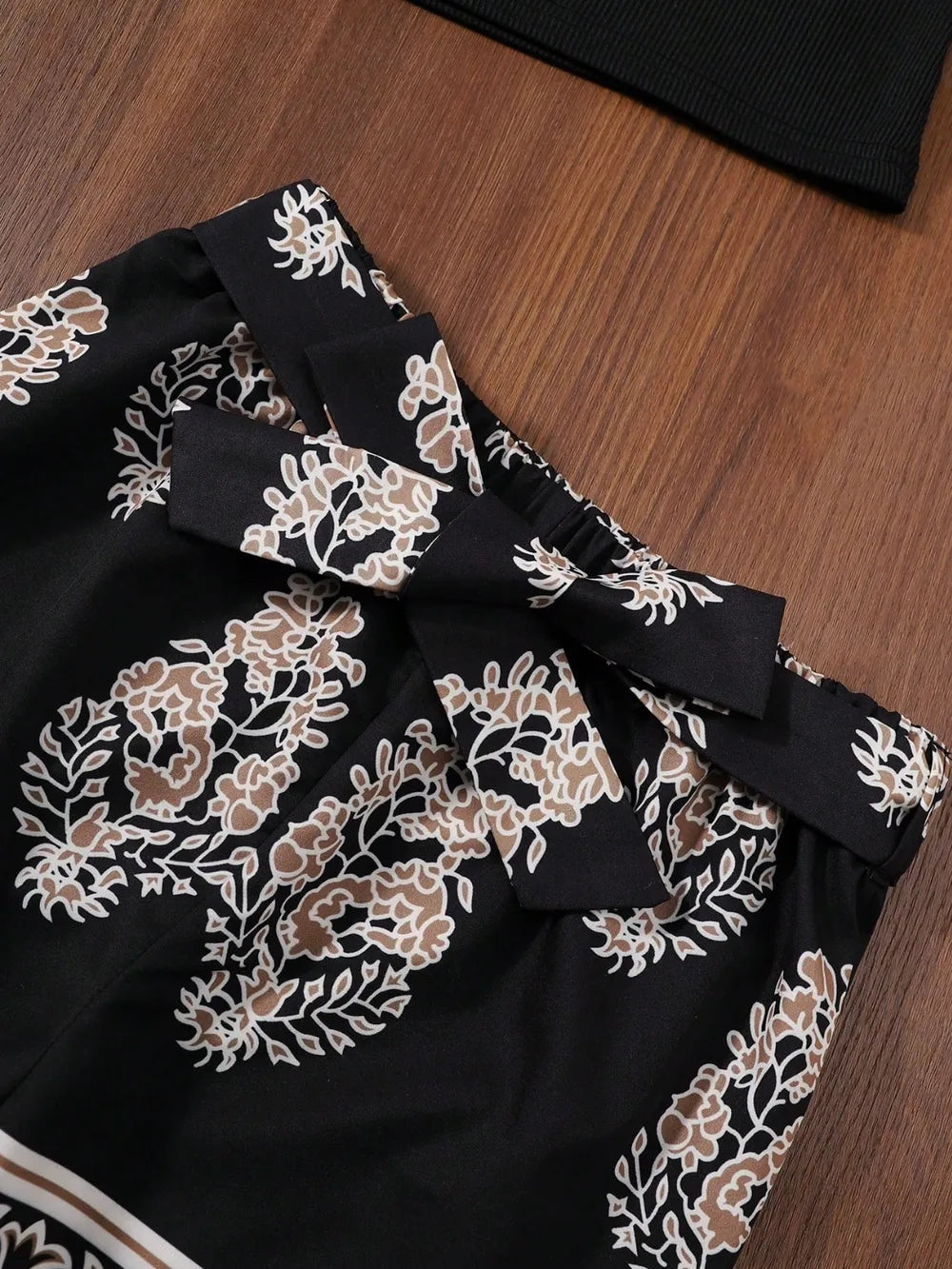 Children’s outfit set: sleeveless cami top with coordinating printed pants, comfy and stylish for kids