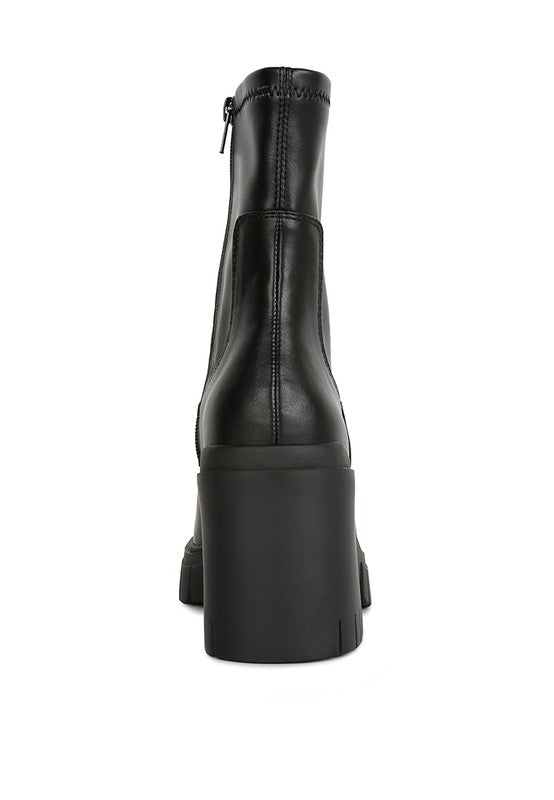 Black leather ankle boot with a chunky platform heel.
