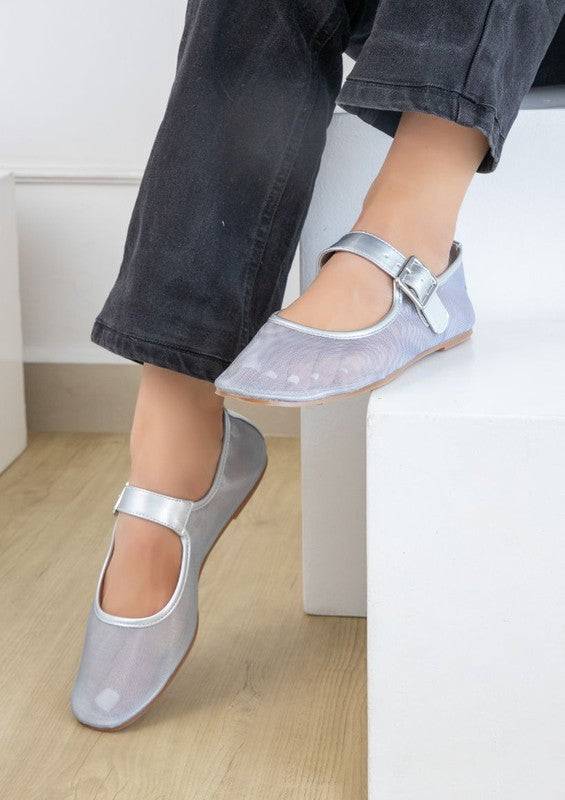 Jelly sandals featuring ankle strap with buckle closure, rounded closed-toe cut, thick flatform sole, slip-on style