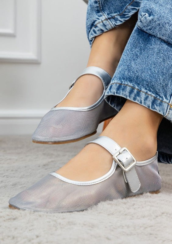 Jelly sandals featuring ankle strap with buckle closure, rounded closed-toe cut, thick flatform sole, slip-on style