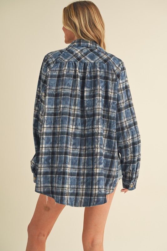 Button-up front closure for classic flannel shirt style.