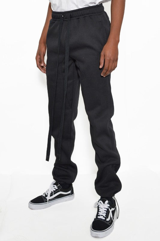 These sweatpants are your go-to for comfort that doesn’t quit. Crafted from thick, breathable cotton fleece, they deliver warmth without the bulk—perfect for chilly mornings, laid-back weekends, or post-workout recovery