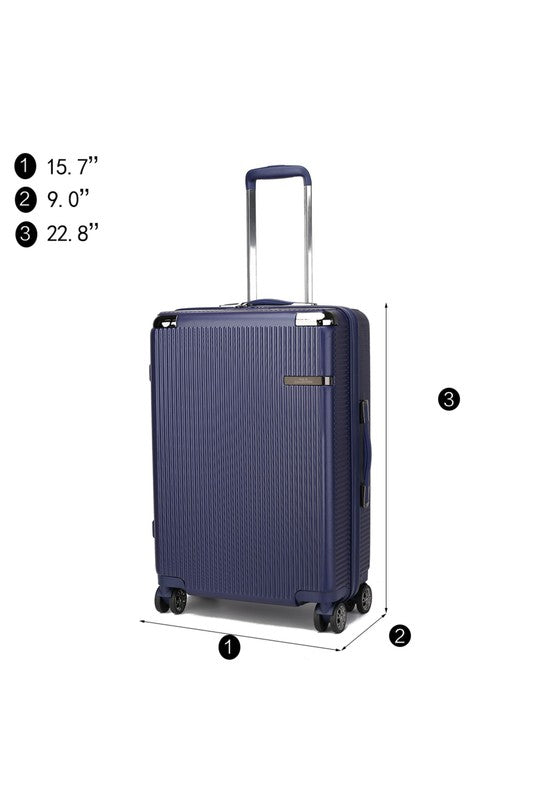 Navy blue hard-shell suitcase with vertical texture, telescopic handle, and four double spinner wheels—measuring 15.7" wide, 9.0" deep, and 22.8" high.