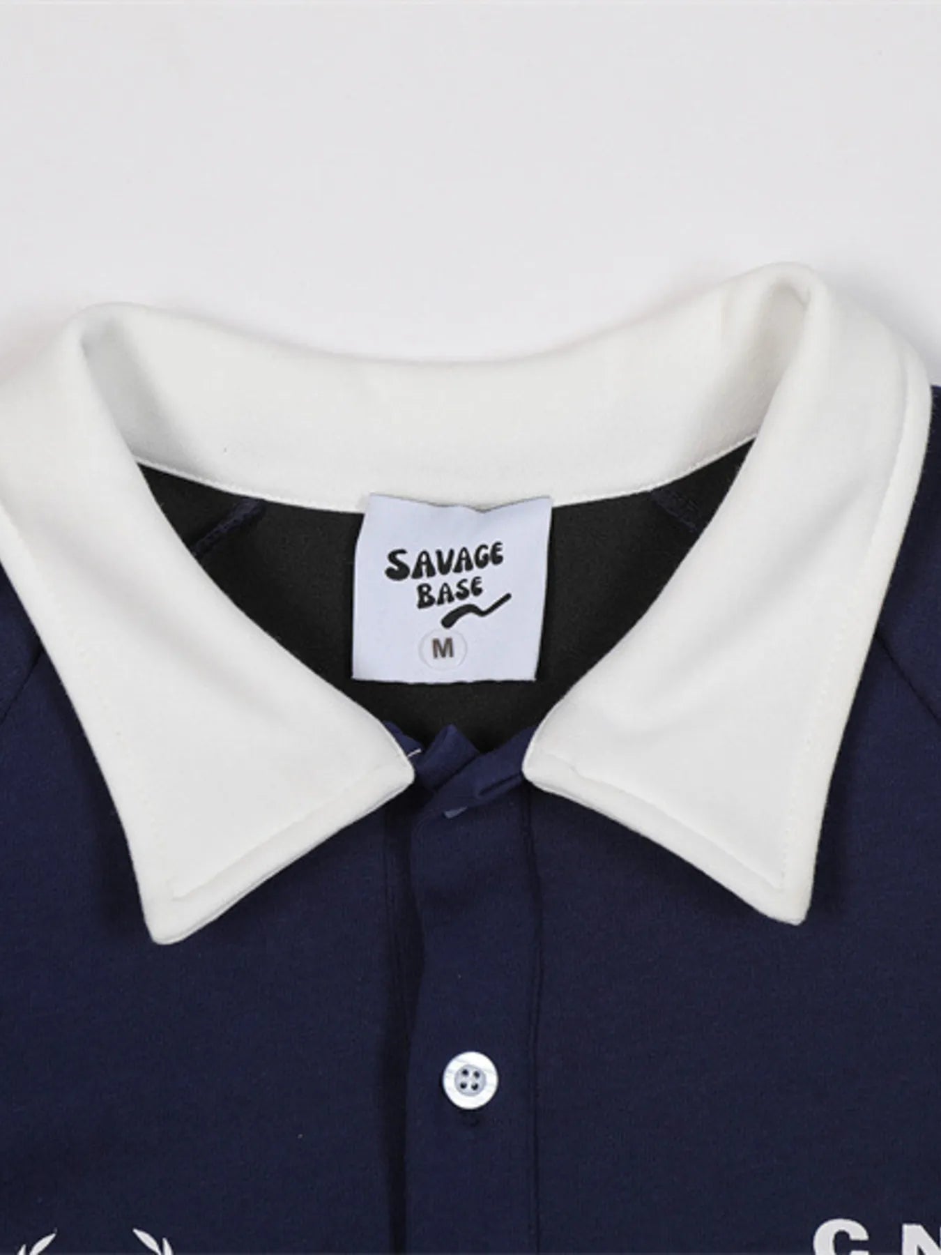 This men’s long-sleeve polo sweatshirt combines a contrasting-letter design with comfortable, versatile styling for casual or sporty looks.