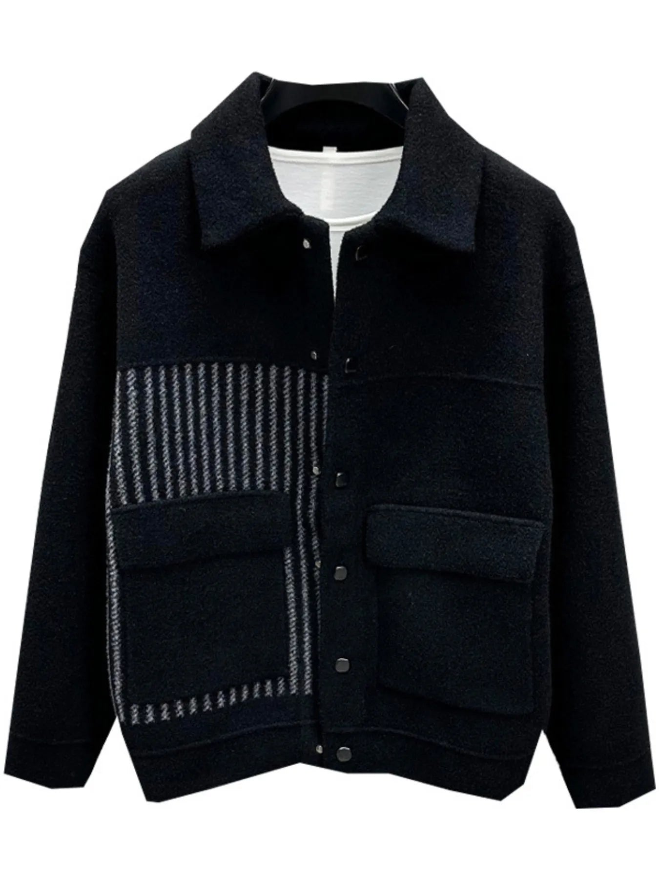 Black jacket with patterned patch on a white background