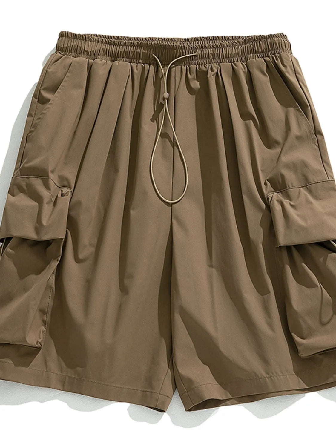 Brown cargo shorts on a white background